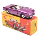 Dinky Toys Triumph Spitfire (114). An example in metallic purple with metallic gold interior, spun