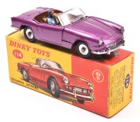 Dinky Toys Triumph Spitfire (114). An example in metallic purple with metallic gold interior, spun