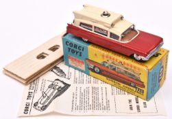 Corgi Toys Superior Ambulance (437). In red and cream with red light to roof, complete with
