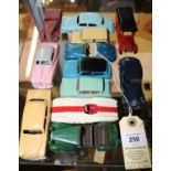 12 Dinky Toys most for restoration. Including 9 over painted examples, Mini Clubman, Ford Anglia,