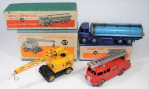 3x Dinky Toys. A Foden FG 14-ton tanker (504), with dark blue cab and chassis, light blue tank and