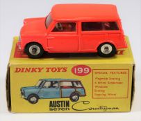 A rare Dinky Toys Morris Mini Traveller (197). An example in fluorescent orange with red interior,