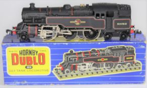 A scarce Hornby Dublo 3-rail BR Class 4MT 2-6-4 Standard tank locomotive (3218) in lined black