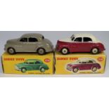 2 Dinky Toys Morris Oxford (159). An example in stone grey-brown with tan ridged wheels. Plus