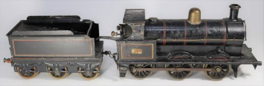 A Gauge One tinplate Bing for Bassett Lowke clockwork LNWR 0-6-0 tender locomotive. A '