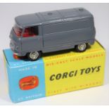 A Scarce limited run Corgi Toys Commer Van. An example in dark grey with red interior and wider