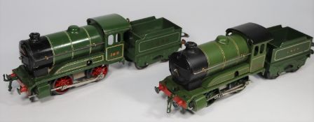 2 Hornby O Gauge 0-4-0 clockwork tender locomotives. Both in lined dark green LNER livery, RN1842
