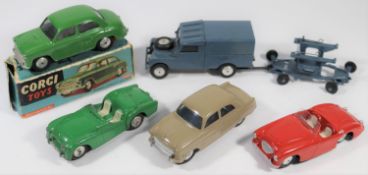 6 early Corgi Toys. Morris Cowley (202M) in dark green, in working order, boxed-damaged and one