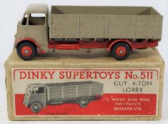 A Dinky Supertoys Guy 4-ton lorry (511) with first type cab. Example in fawn with red chassis and
