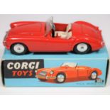 Corgi Toys M.G.A. Sports Car (302). In bright red with cream seats, smooth spun wheels and
