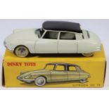 French Dinky Toys Citroen DS19 (24C). In cream with black roof, plated ridged wheels and white