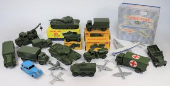 A quantity of boxed and loose Dinky Military toys etc. Centurion Tank (651). Scout Car (673), Army