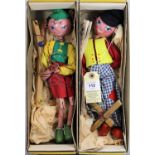 2 standard Pelham Puppets. Both Tyrolean style, a boy in white/blue check trousers, with red shirt