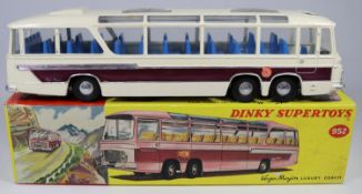 Dinky Supertoys Vega Major Luxury Coach (952). Example in white with mauve flash to sides and dark