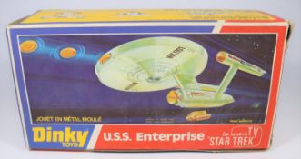 A Dinky Toys Star Trek U.S.S. Enterprise (358). Complete with sealed packet of 8x missiles and a