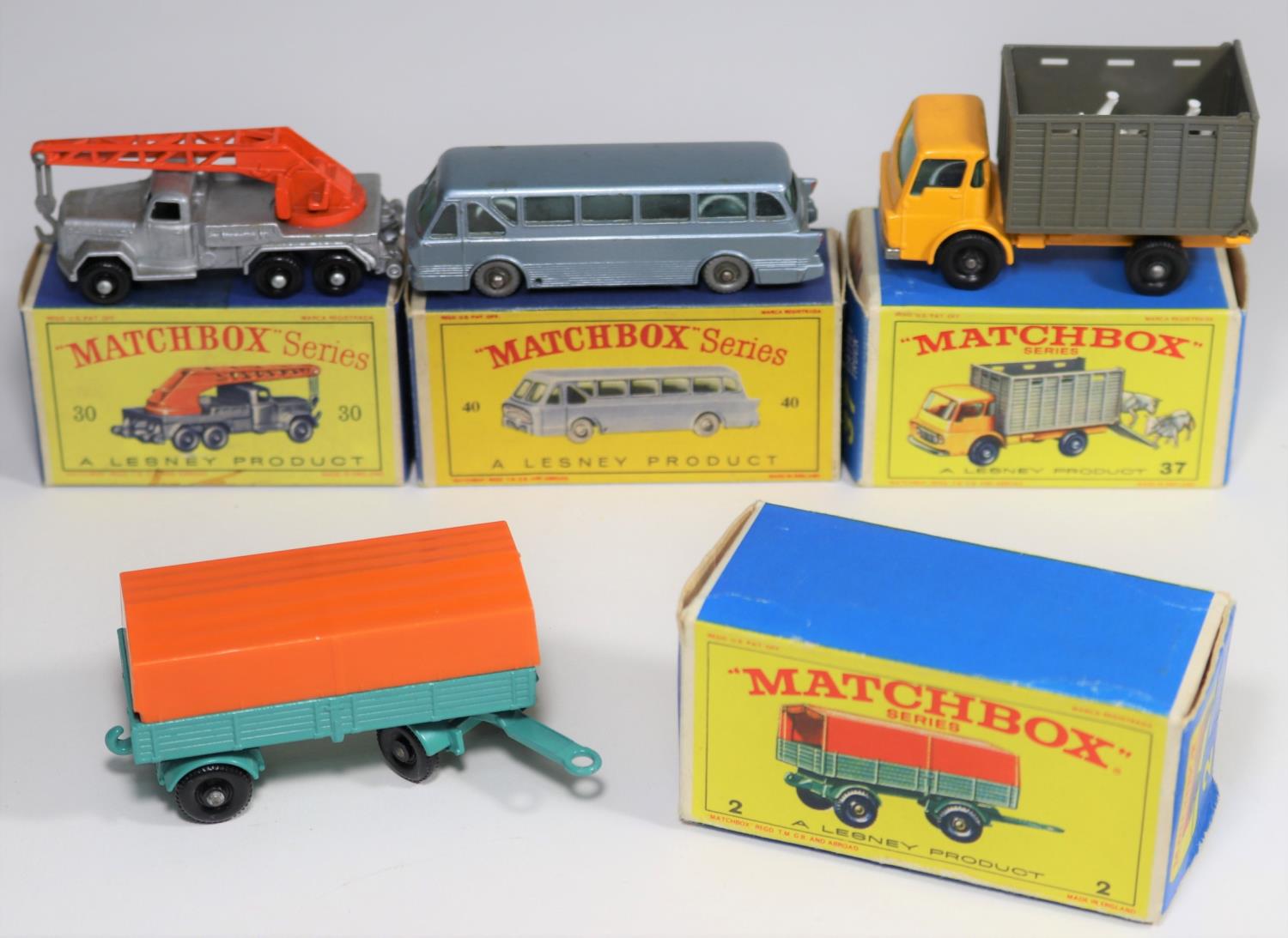 4 Matchbox Series. No.2 Mercedes Trailer in turquoise with orange tilt. No.30 Leyland Tiger Long