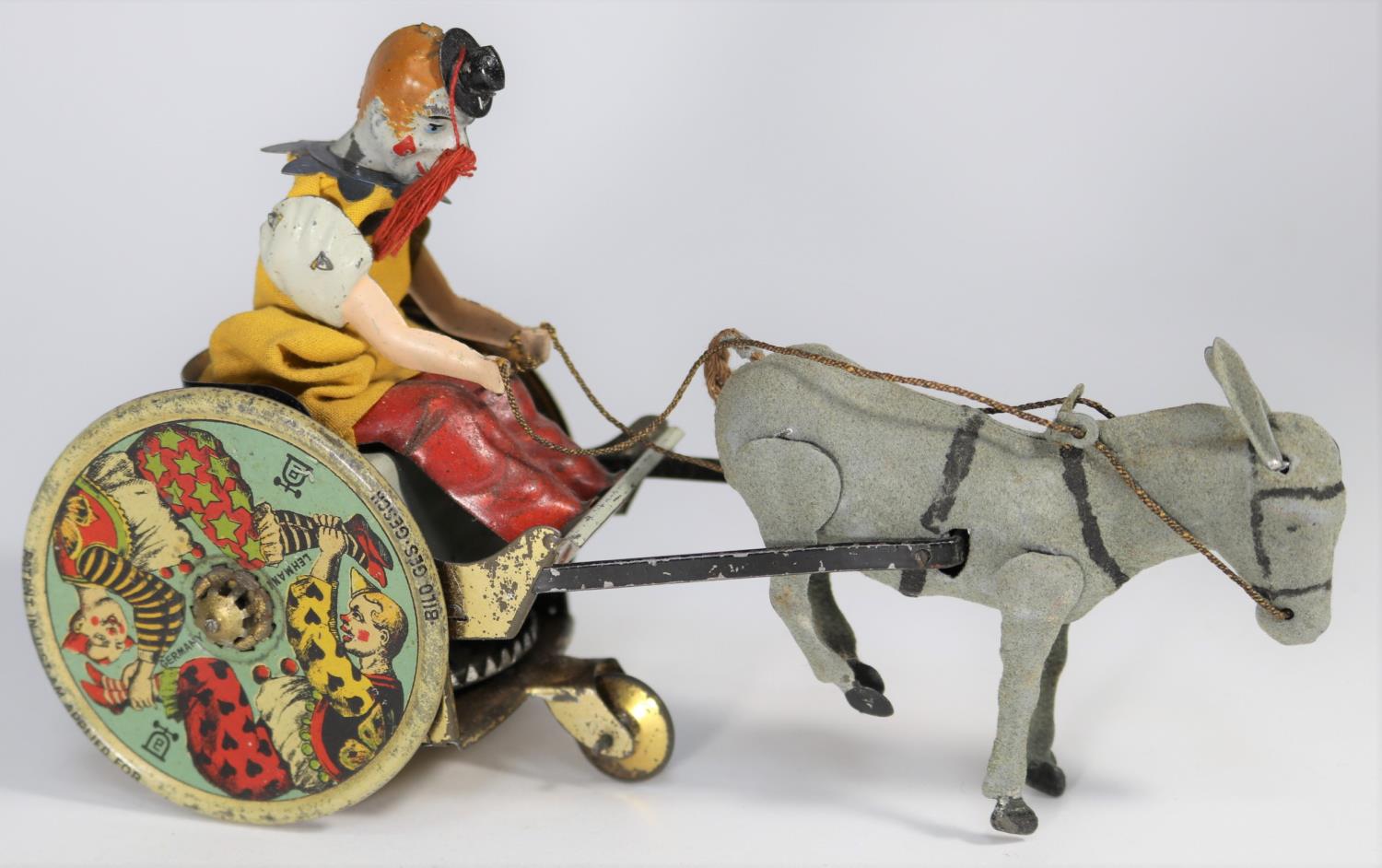 A rare Lehmann 1930s tinplate Balky Mule (Stubborn Donkey) No.425. Clockwork 2-wheel cart with clown
