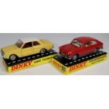 2 Dinky Toys Cars. A Ford Taunus 17M (154). In cream with white roof, red interior, wheels with