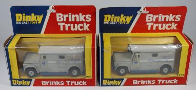 2 Dinky Toys Brinks Truck (275). Both in light grey with white roof and blue bases and front bars,