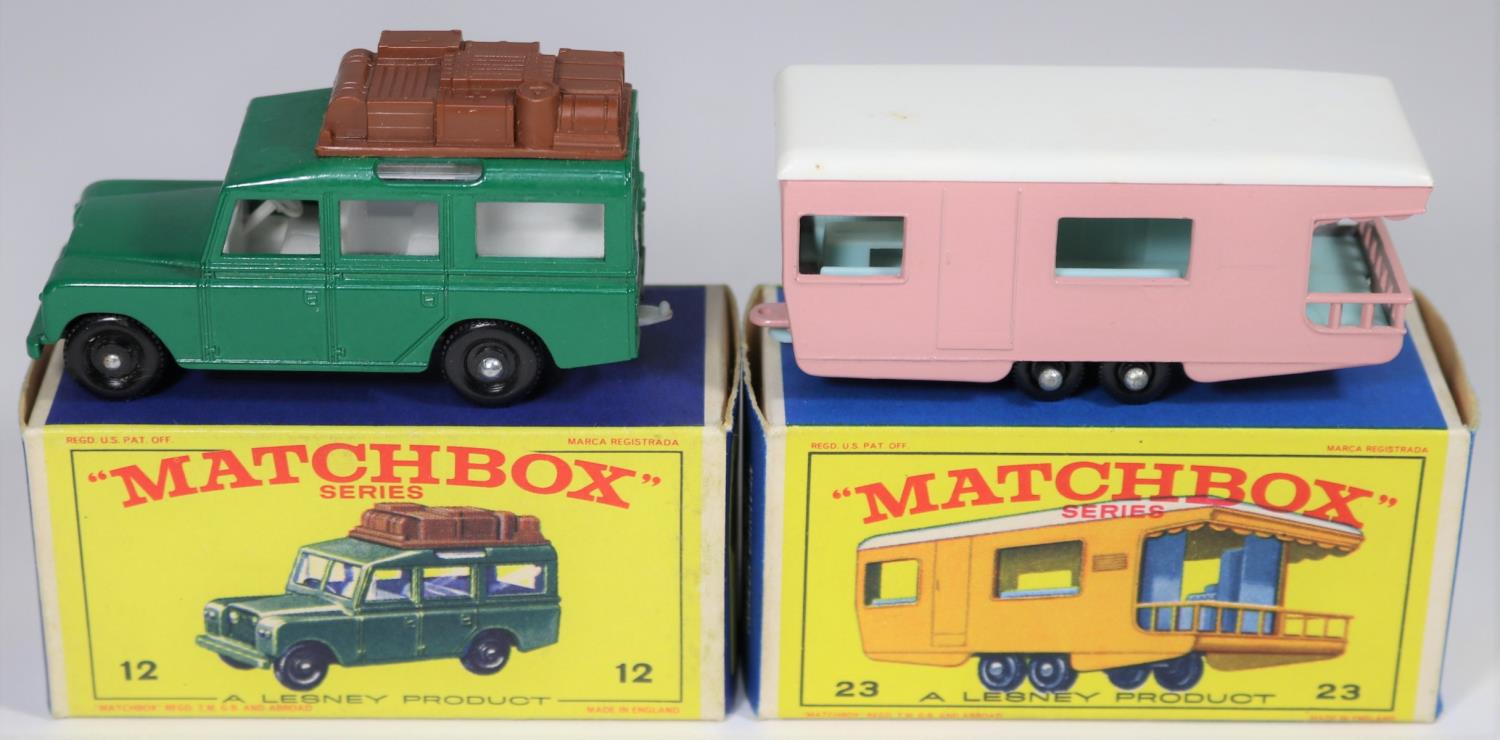 2 Matchbox Series. Safari Land Rover in dark green with white interior, with brown plastic luggage