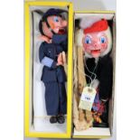 2 Pelham Puppets. Policeman (SM6). In dark blue uniform with helmet holding his truncheon. In a late