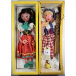 2 Pelham Puppets. Mitzi SS8 with red skirt with yellow and green wavy lower decoration, white blouse