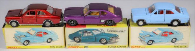 3 Dinky Toys. Ford Capri (165). Example in metallic purple with deep yellow interior, detailed alloy