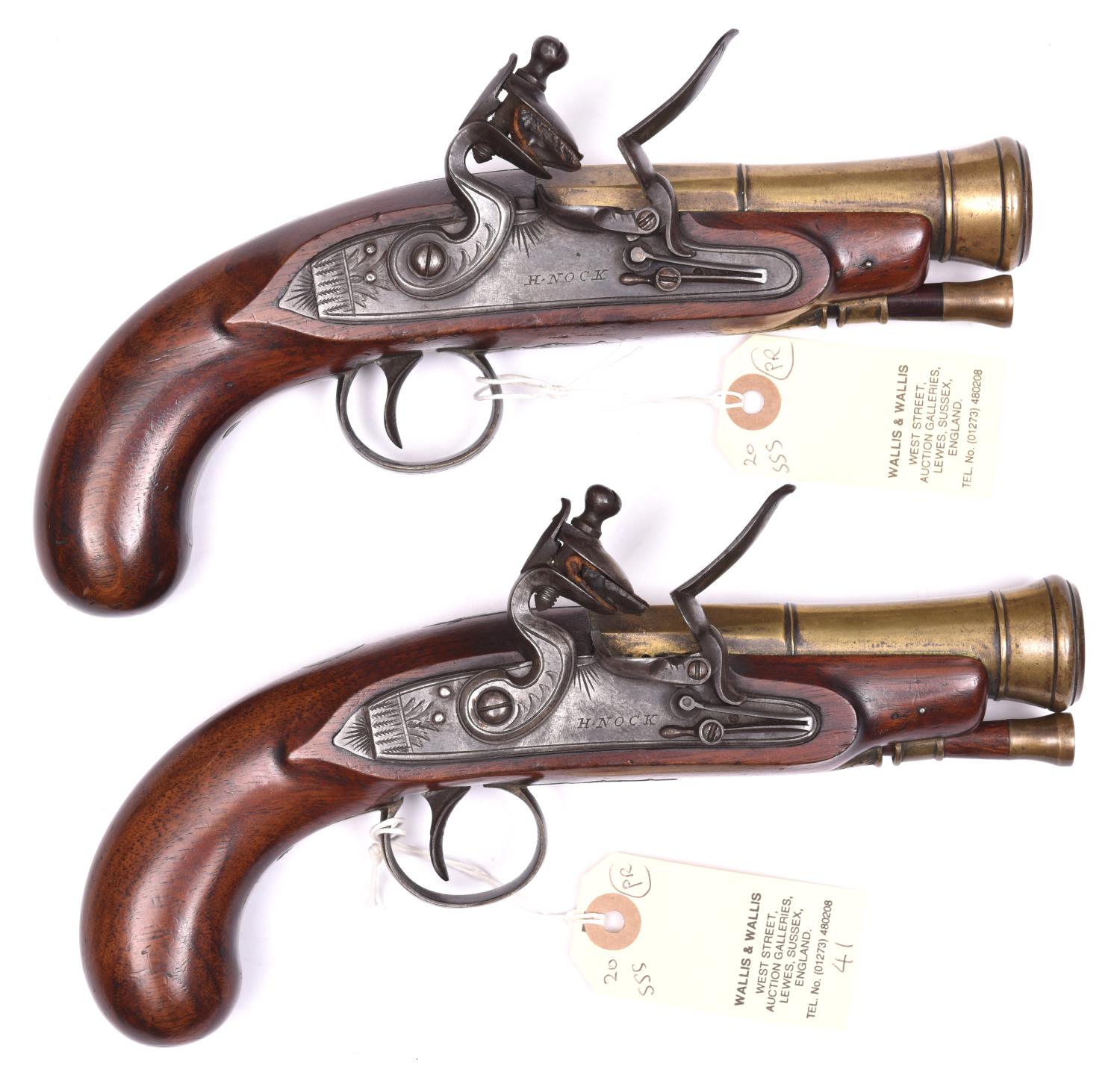 A pair of brass barrelled flintlock blunderbuss travelling pistols, marked H. Nock, London, c