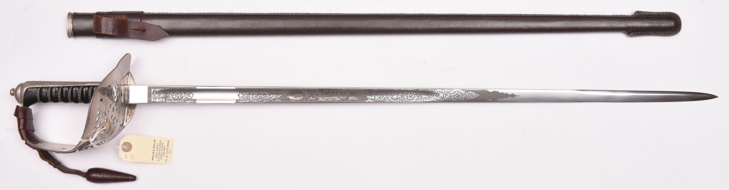 An Elizabeth II infantry Officer’s sword, straight, fullered blade 32½”, etched on both sides with