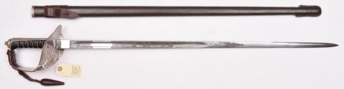 An Elizabeth II infantry Officer’s sword, straight, fullered blade 32½”, etched on both sides with