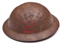 A WWI raw edge Brodie’s pattern steel helmet, red painted black letter “Z” (Channel Islands “),