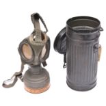 A Third Reich civilian Luftschutz gas mask, the filter with waffenamt stamp, date 1940, and with