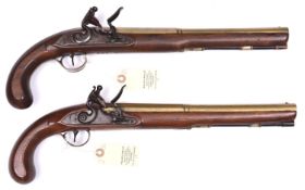 A pair of long 16 bore brass barrelled flintlock duelling pistols, by Robert Wheeler, c 1780, 17½”