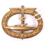 A Third Reich U boat badge, the back marked “Frank & Reif, Stuttgart”. GC