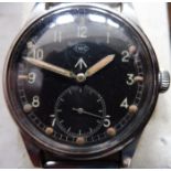 A British military issue WWW wristwatch by IWC, back marked with broad arrow over “W.W.W. M16837”,