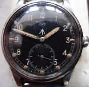 A British military issue WWW wristwatch by IWC, back marked with broad arrow over “W.W.W. M16837”,