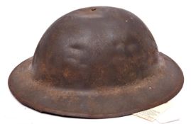 A WWI Brodie’s pattern steel helmet, with (faint) tartan square transfer device for Highland Regt,