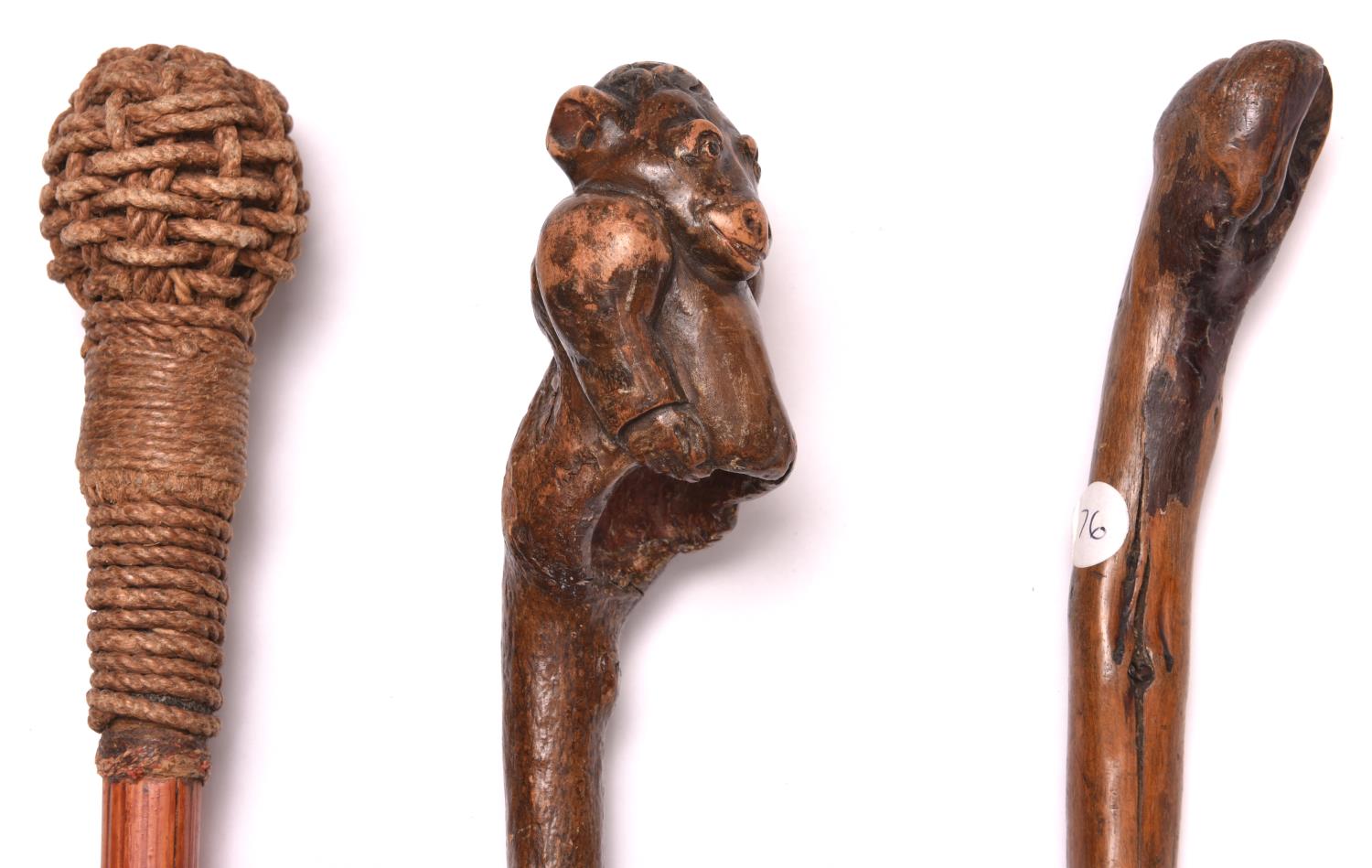 A knotted darkwood walking cane, the rootwood top carved in the form of a gorilla torso, brass - Image 2 of 2