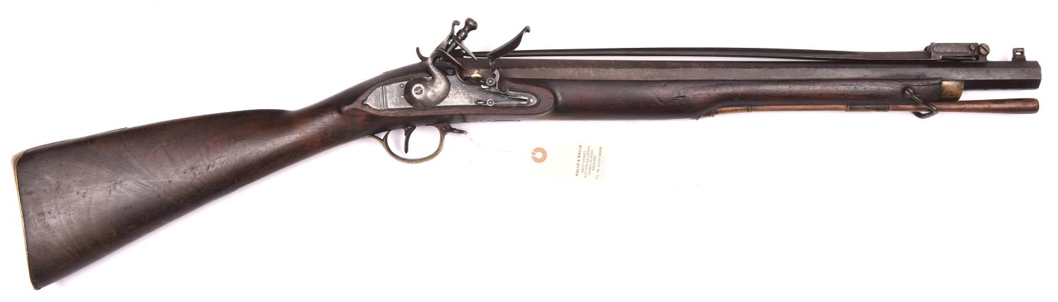 A 12 bore flintlock coaching carbine with top spring bayonet by Brummit (Nottingham) c 1800, 35½”