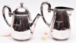 An elegant heavy quality Italian coffee pot and matching hot water jug, line decorated rims, and