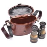 A WWII German brown bakelite binocular case, with small waffenamt stamp and maker’s code “ihg” and