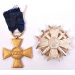 A Third Reich War Merit Cross 1st class, with screw in fluted disc fitting, VGC; and an Imperial