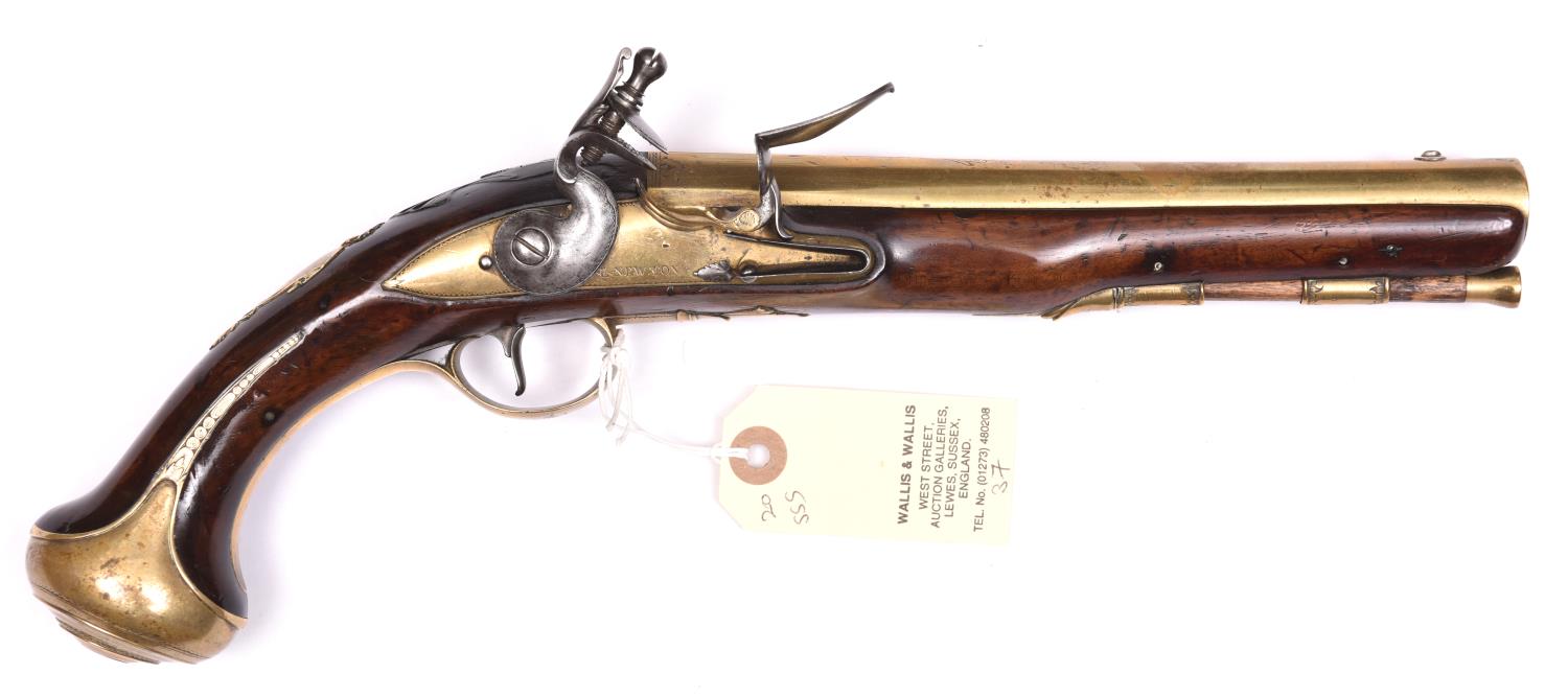 A 16 bore brass barrelled flintlock holster pistol, by E Newton of Grantham, c 1775, 13½” overall,