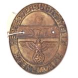 A Third Reich oval cast brass plaque, inscribed around the rim “Heeresversuchsstelle Peenemunde”,