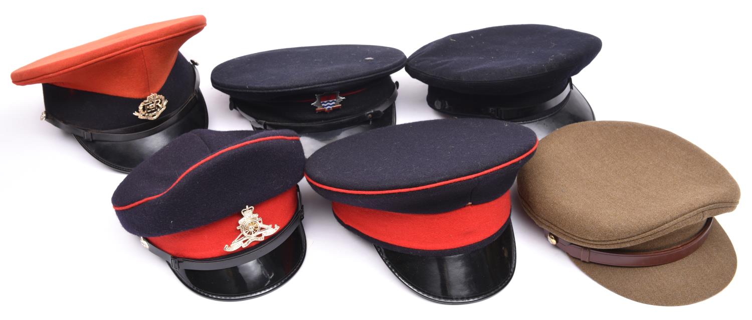 6 peaked caps, including ERII R M Police, ERII Women’s R Artillery and London Fire Brigade,