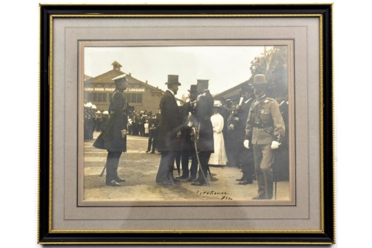 An early 19th century signed photograph of F. Marshal Lord Kitchener, wearing peaked cap and frock