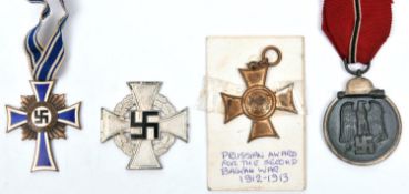 A Third Reich medal for the Eastern Front, and a Mother’s Cross in bronze, both with ribbons, a