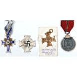A Third Reich medal for the Eastern Front, and a Mother’s Cross in bronze, both with ribbons, a