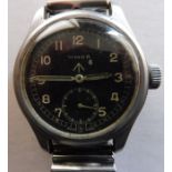 A British military issue WWW wristwatch by Timar, the back marked “Timor broad arrow WWW K 1675/
