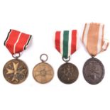 Third Reich medals: bronze Medal of Merit without swords; Return of Memel; West Wall; and War